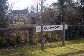 Colmworth name board in March 2007
